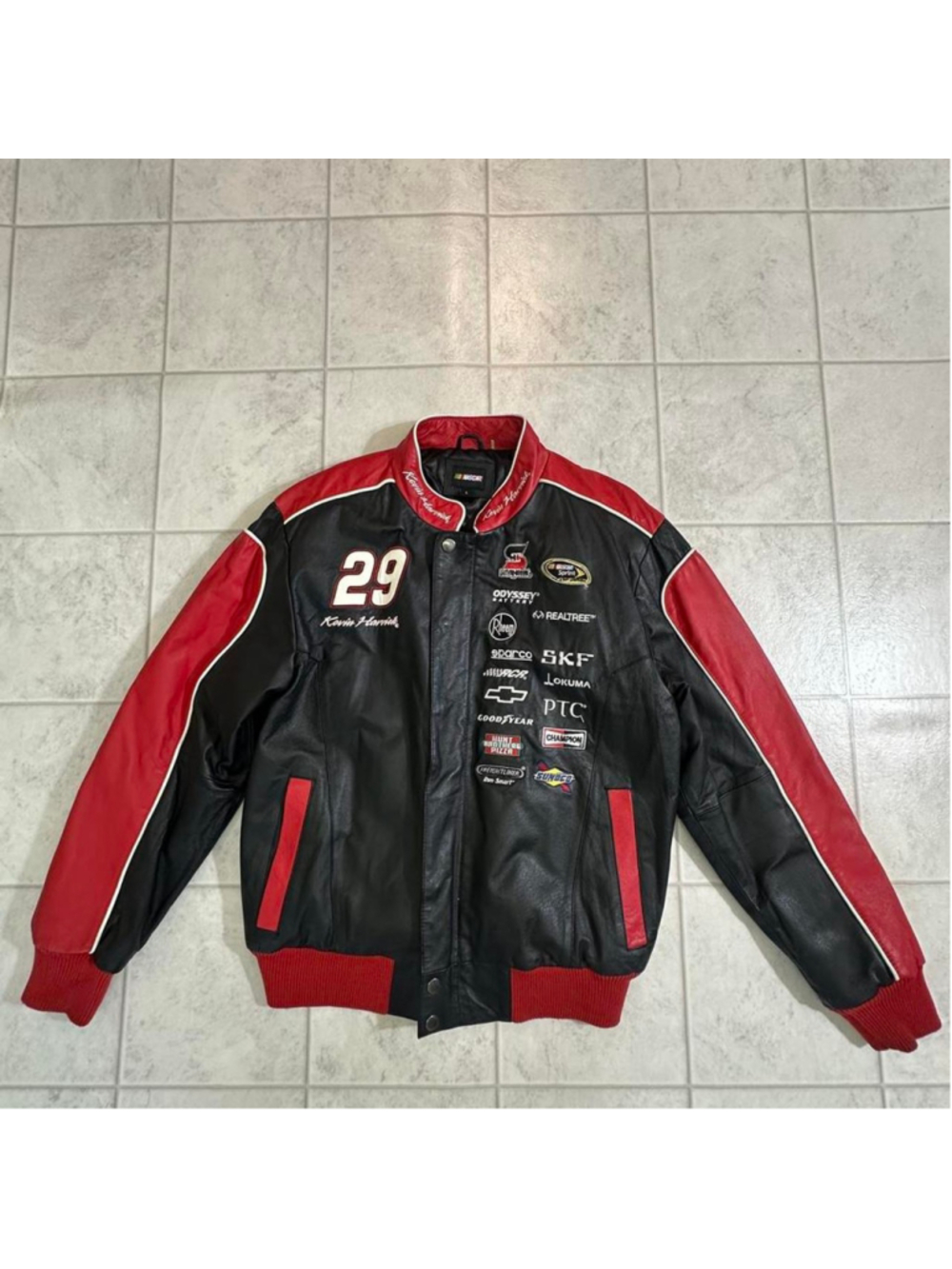 This is a Chase Authentics leather Kevin Harvick NASCAR jacket featuring multipl